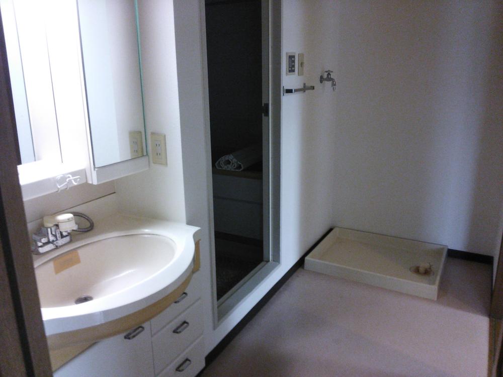 Bathroom. It is a lavatory and bath.