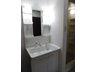 Wash basin, toilet. Vanity had made