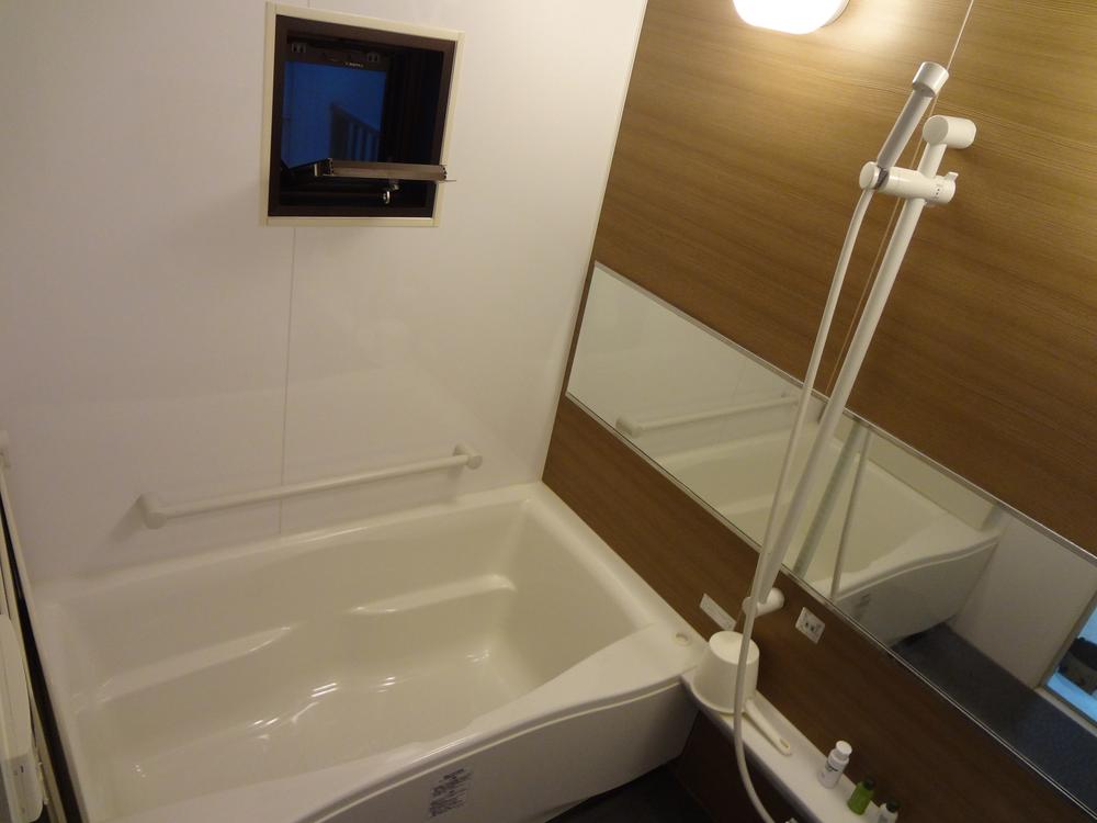 Bathroom. In bathroom, We have with a window.
