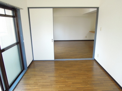 Living and room. It can also be used as a large living room you open the sliding door