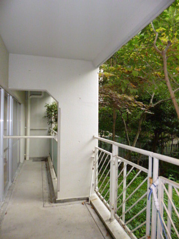 Balcony. There is a door to the boundary between the private garden.