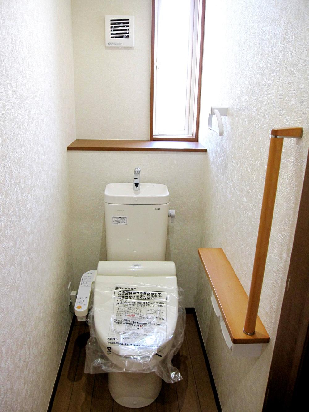 Toilet. First floor and with automatic open function washlet of it is installed respectively on the second floor