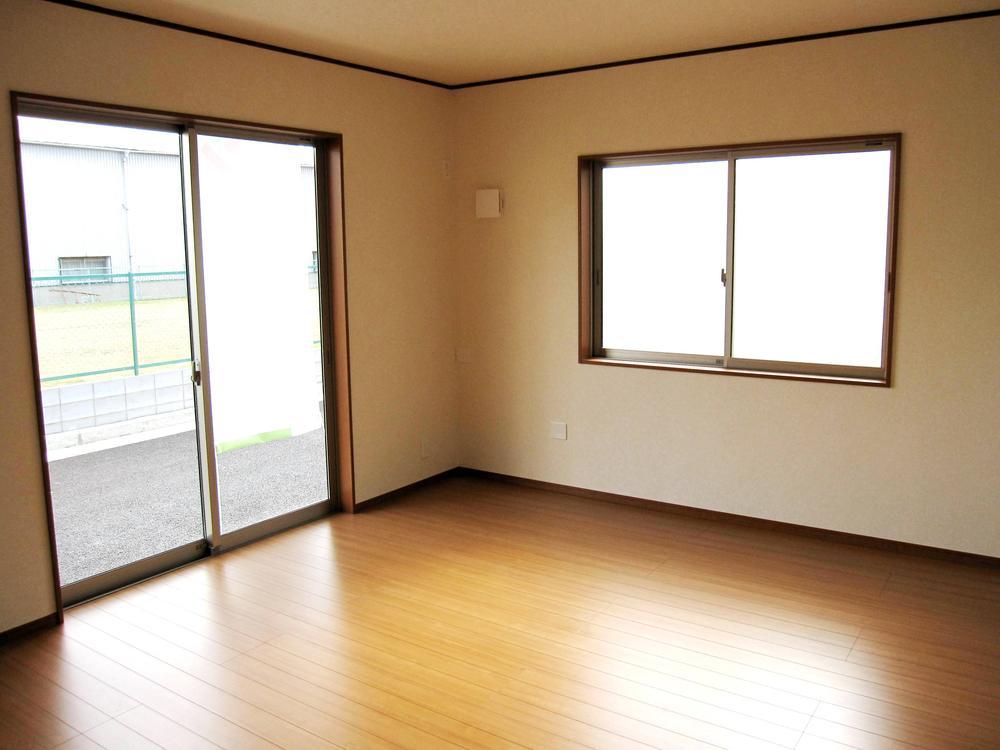 Living. Living room bathed in bright natural sunlight