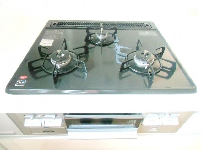 Kitchen. Three-necked stove that can cook at the same time