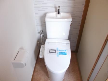 Toilet. Toilet also has replaced with a new one of the hot water washing type.