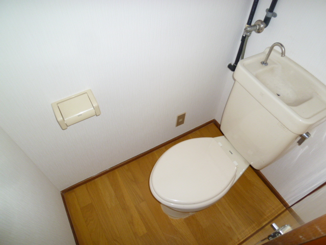 Toilet. It is easy to ventilation and comes with a window in the toilet!