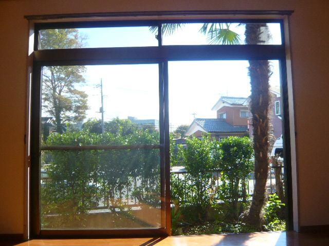 View photos from the dwelling unit. Shoot the south side from the first floor