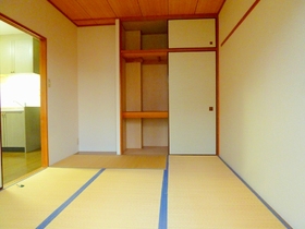 Living and room. There are three stages of storage space, There is a room