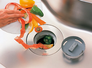Kitchen.  [Disposal system] Disposer that can handle the garbage hygienically.
