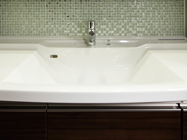 Bathing-wash room.  [Counter-integrated basin bowl] Seamless counter-integrated basin bowl.