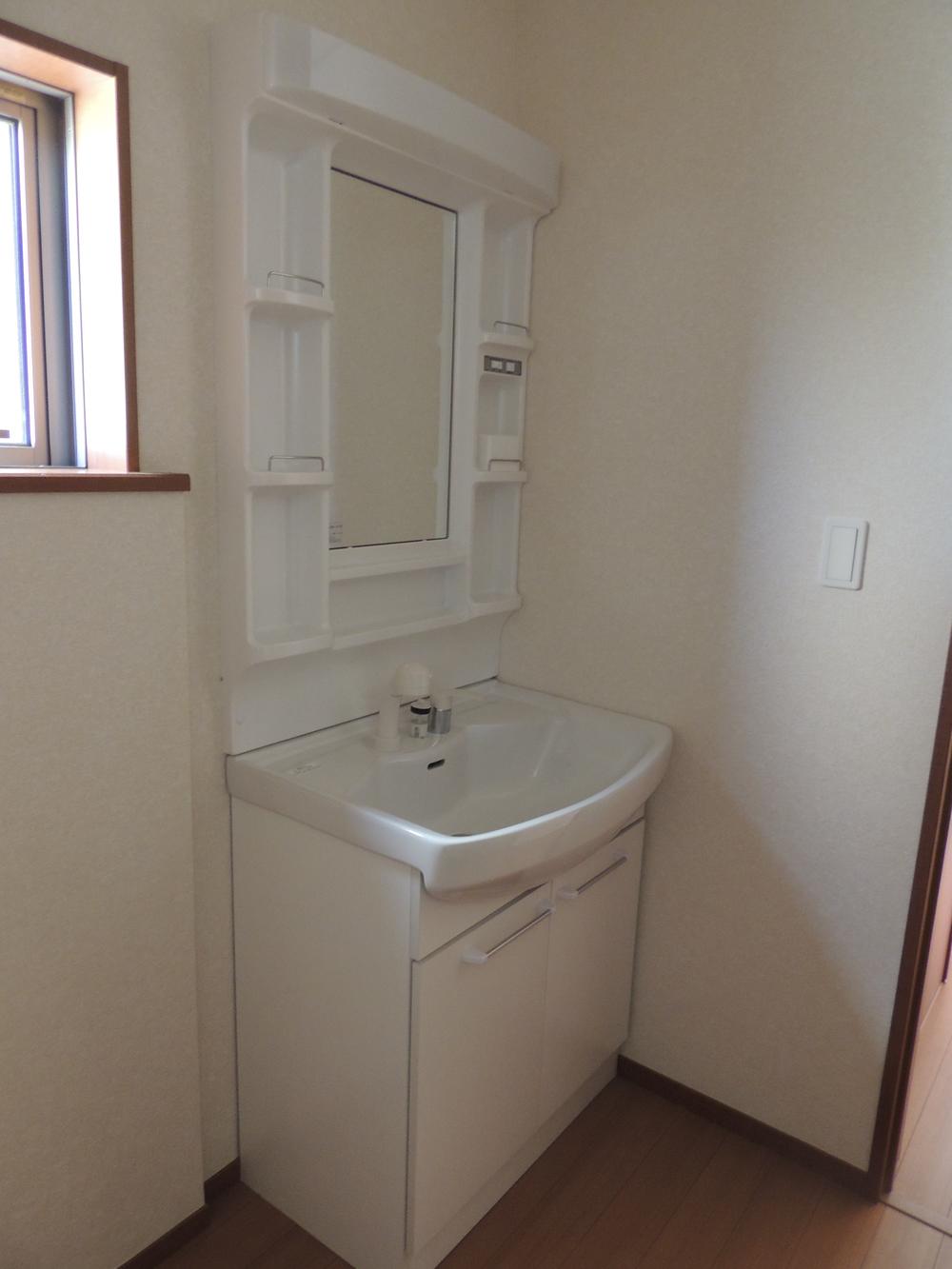 Wash basin, toilet. Interior