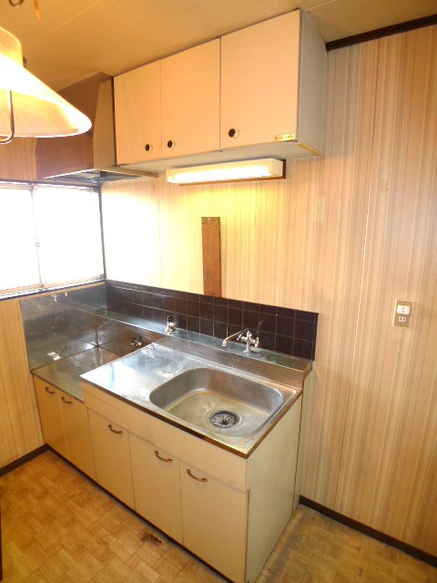 Kitchen. It is a photograph of the same floor plan different rooms