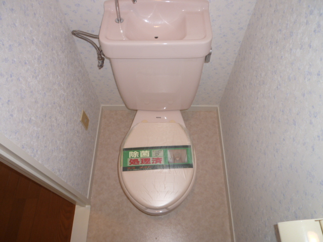 Toilet. It is another room of the same type.