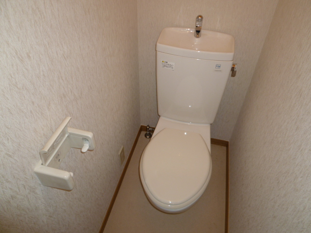 Toilet. The same is by Property of the room. (It is a photograph of another floor plan)