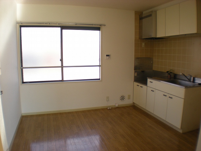 Kitchen. Bright and there is a window kitchen