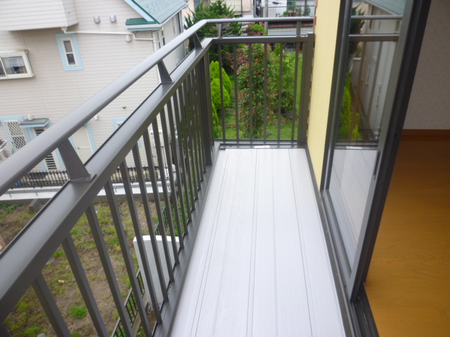 Balcony. It is a photograph of another room