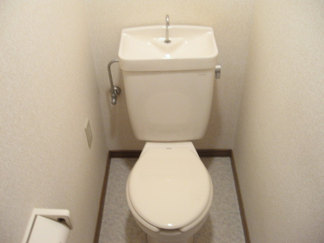 Toilet. It is another room of the same type. 