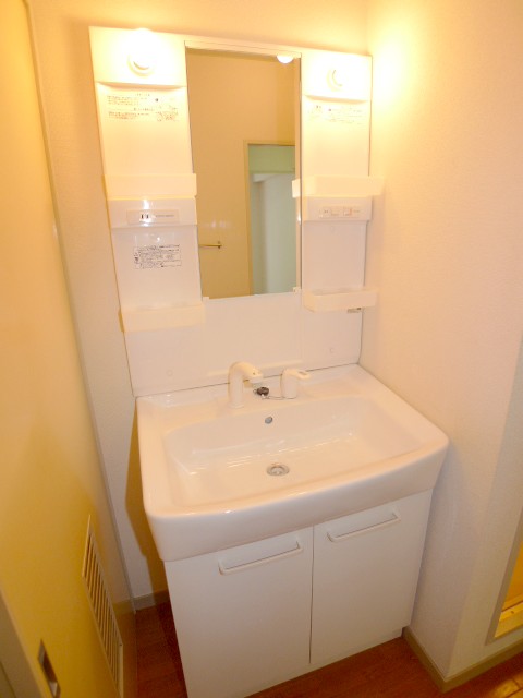 Washroom. It is a photograph of the different rooms