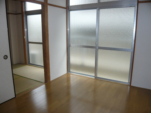 Other room space. It is a photograph of the same type of room