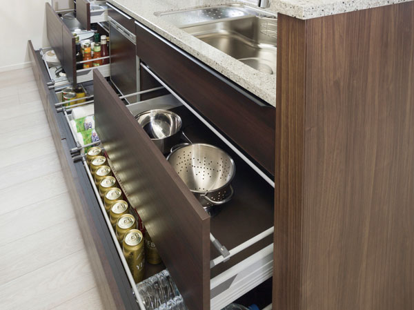Kitchen.  [All slide storage] Under-counter storage is also taken out easily slide drawer back of the thing.