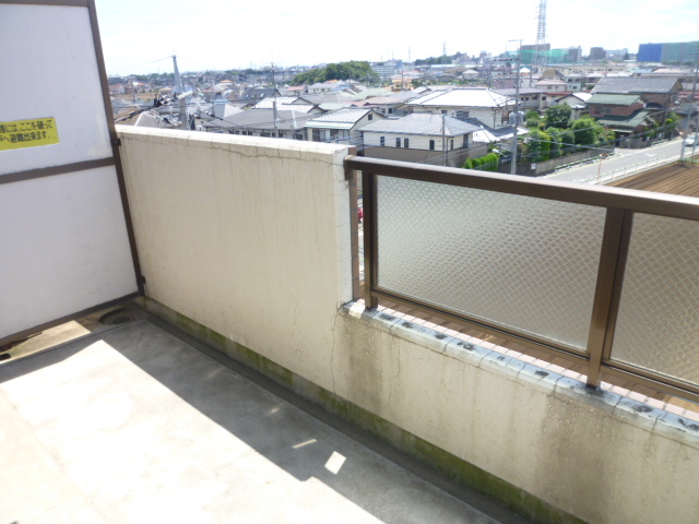 Balcony. It is a photograph of another room