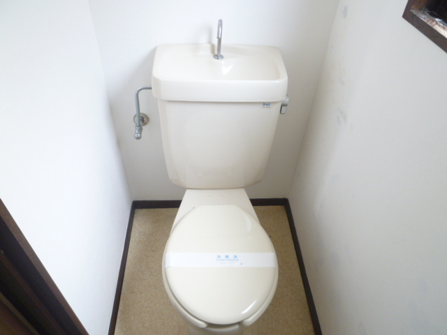 Toilet. Same property, Is another of the room.