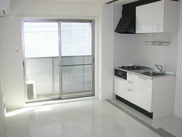 Kitchen. Same property, It is a photograph of another room