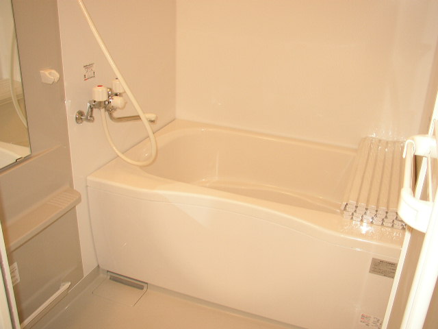 Bath. Same property, It is a photograph of another room