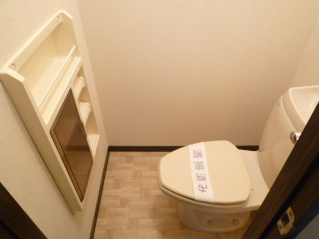 Toilet. For indoor photos of different in Room.