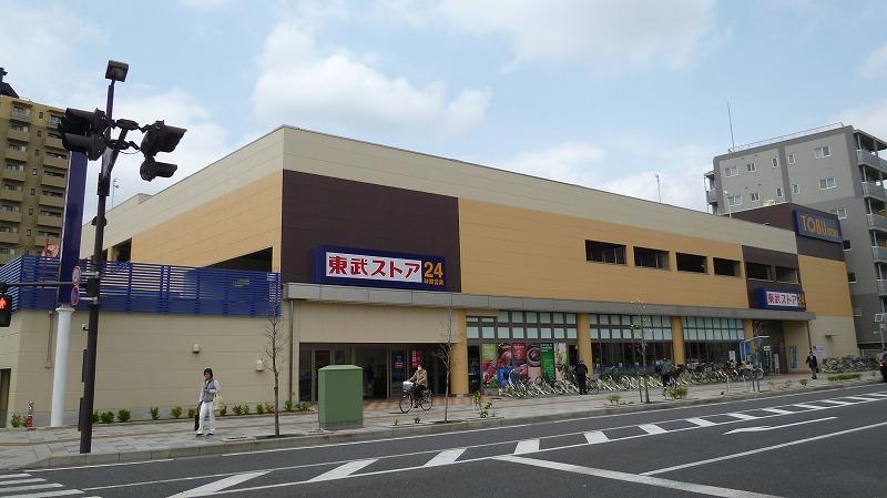 Shopping centre. 1100m to Tobu Store Co., Ltd. Asaka shop