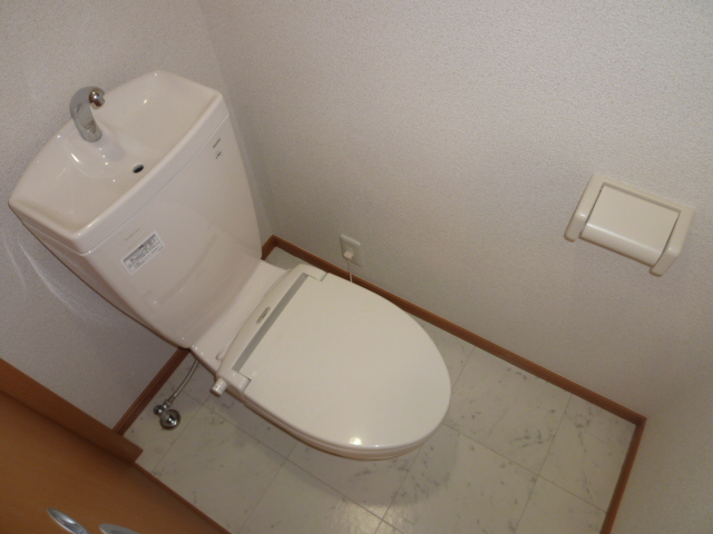 Toilet. Same property, Is another of the room.