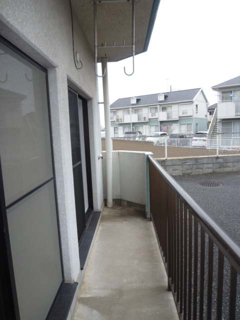 Balcony. It is a photograph of another room