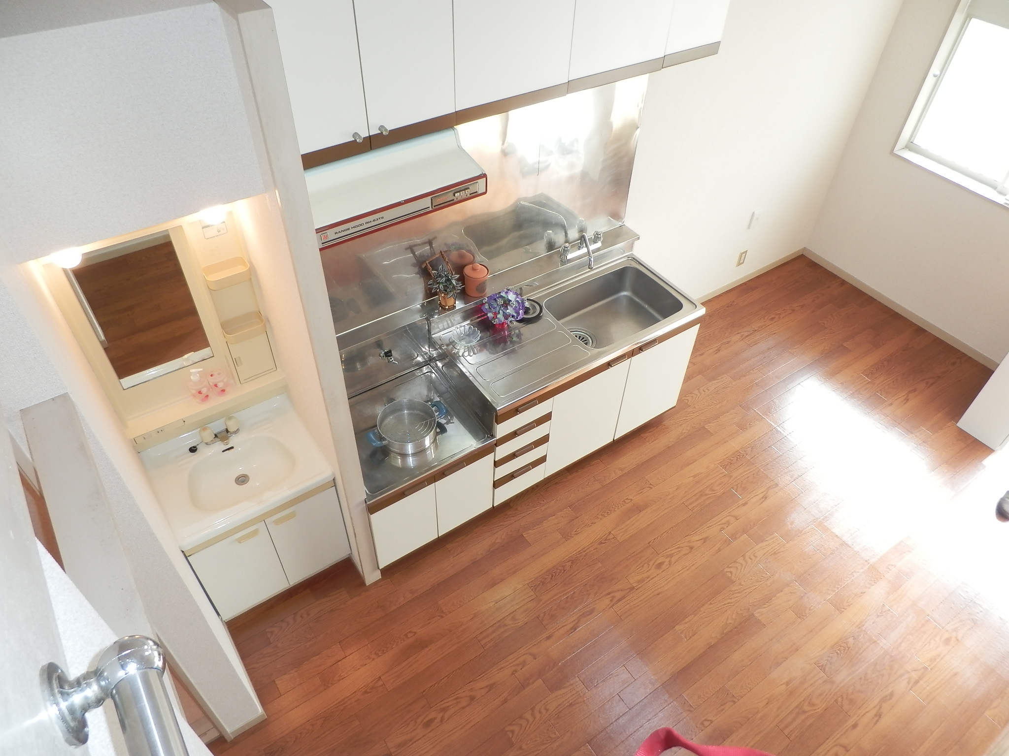 Washroom. From loft. The ceiling is high open.