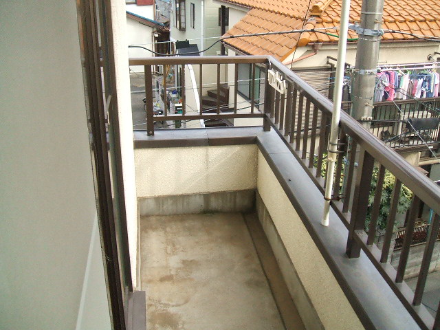 Balcony. It is a photograph of another room