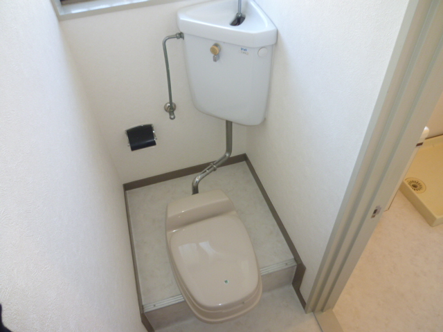 Toilet. Same property, It is a photograph of a different type of room