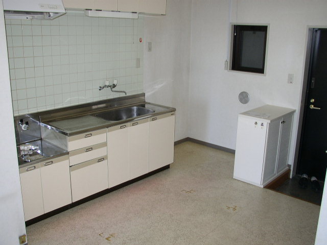 Kitchen. It is a photograph of another room