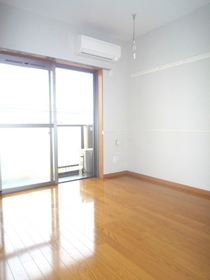 Living and room. It is with the same type air conditioning