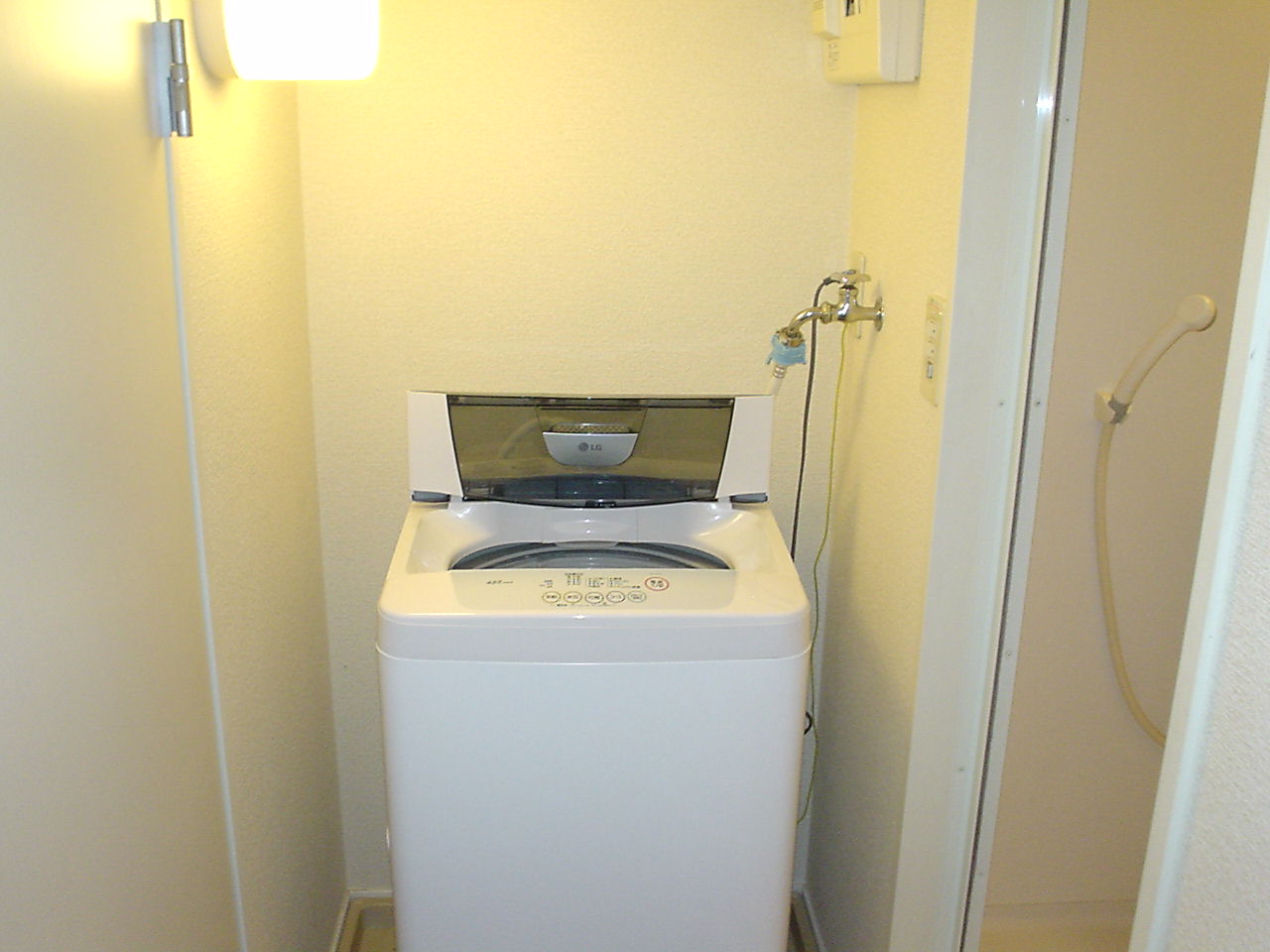Other. It is also equipped with a washing machine.