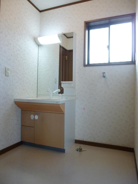 Washroom. Spacious vanity and dressing space with a ventilation window