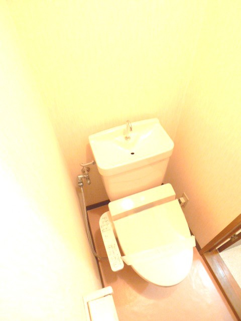 Toilet. A heated toilet seat