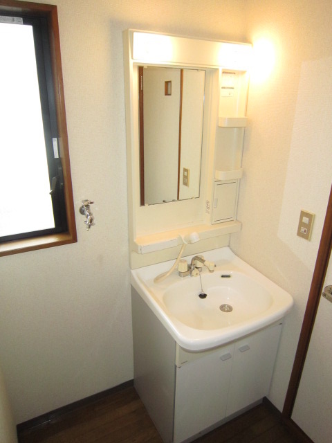 Washroom. With separate wash basin