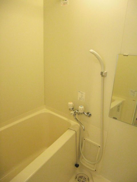 Bath. White is a spacious bathtub with clean which was the keynote.