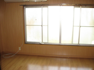 Living and room. It is a photograph of another room (same type)