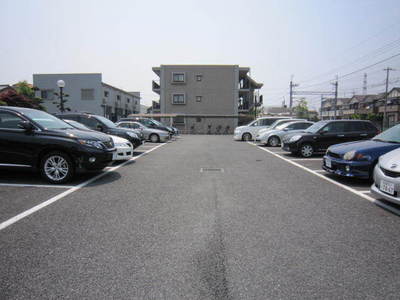 Parking lot. Parking has been paved right in front of the properties of the eye