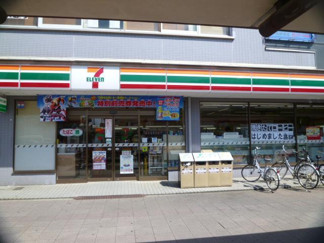 Convenience store. Seven-Eleven Tsurugashima Station West Exit store up (convenience store) 579m