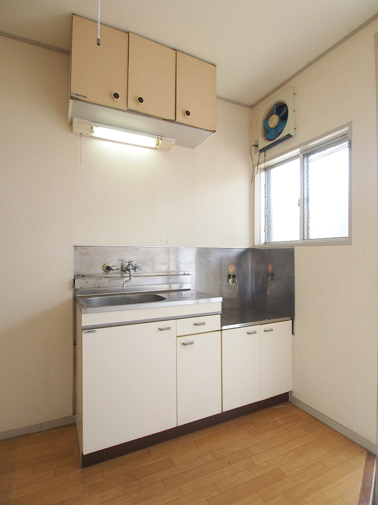 Kitchen. Cleaning is a before photo of.