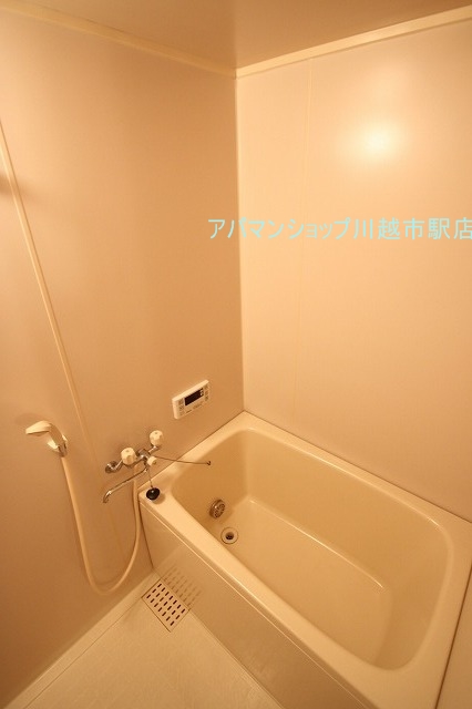 Bath.  ■ Indoor photo is a picture of another room