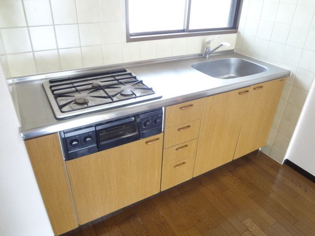 Kitchen. Bright kitchen with also a popular system kitchen window