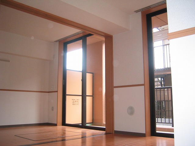 Living and room. It is a photograph of the same type.