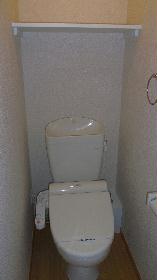 Toilet. Hot water is washing machine with a toilet seat